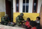Satgas Yonif 631/Antang Sentuh Hati Warga Pedalaman Papua Lewat Bakti TNI